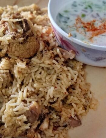 White Chicken pulao with Raita .