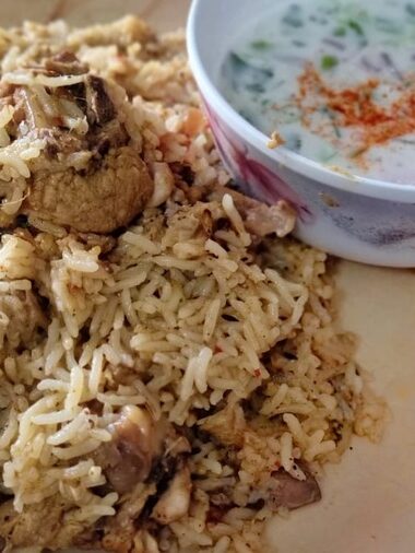 White Chicken pulao with Raita .