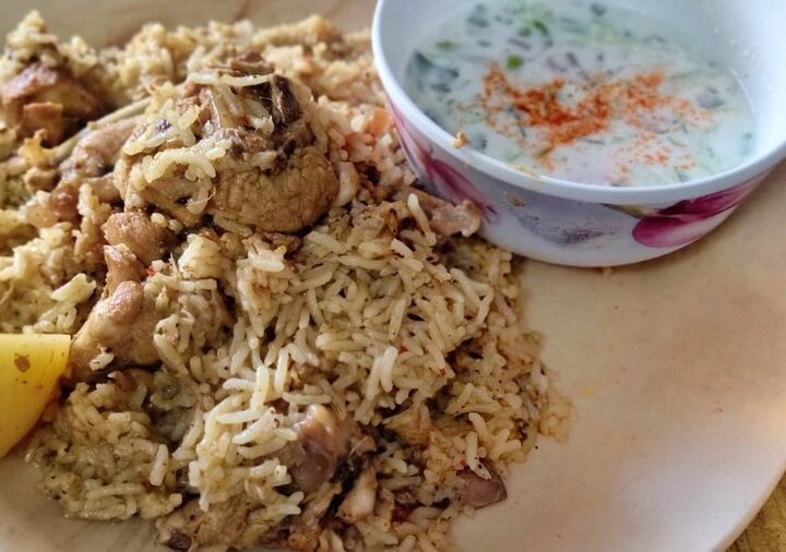 White Chicken pulao with Raita .